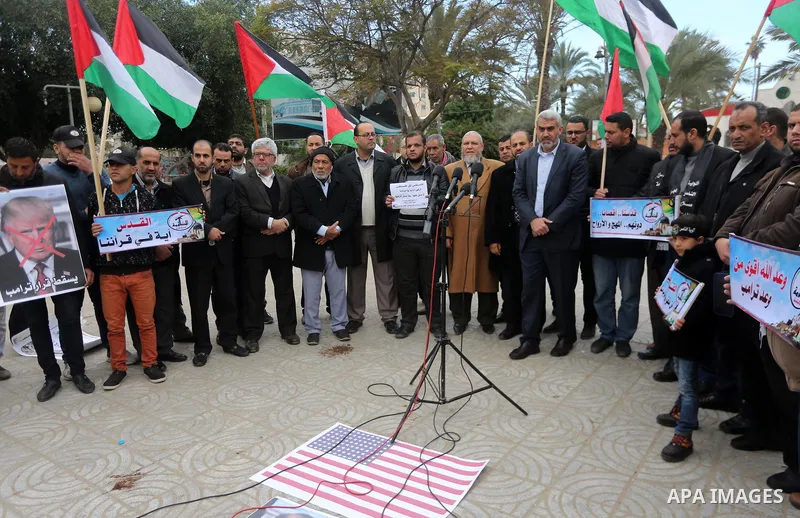 Palestinians attend a press conference during a protest against U.S. President Donald Trump's decision to recognise Jerusalem as the capital of Israel, in Gaza City December 31, 2017. Photo by Mohammed Asad