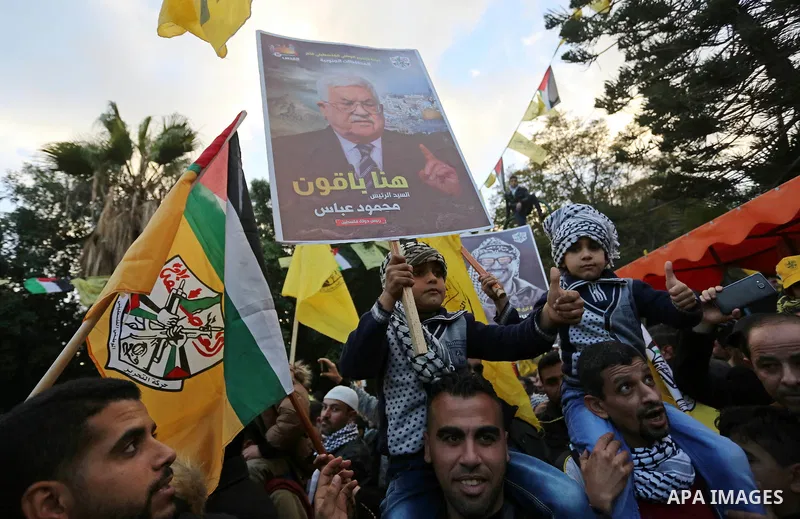 Palestinian supporters of the Fatah movement take part during a rally in Gaza City on December 31, 2017, marking the 53rd anniversary of the creation of the political party. Photo by Ashraf Amra