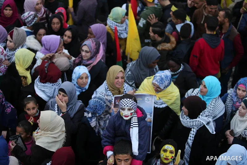 Palestinian supporters of the Fatah movement take part during a rally in Gaza City on December 31, 2017, marking the 53rd anniversary of the creation of the political party. Photo by Ashraf Amra