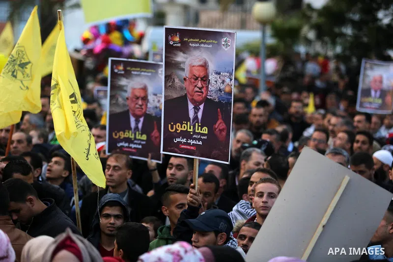 Palestinian supporters of the Fatah movement take part during a rally in Gaza City on December 31, 2017, marking the 53rd anniversary of the creation of the political party. Photo by Ashraf Amra