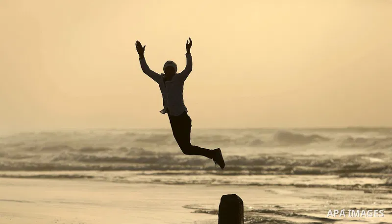Palestinians enjoy their time on the beach in Gaza City on December 31, 2017 on the last day of the year. Photo by Ashraf Amra