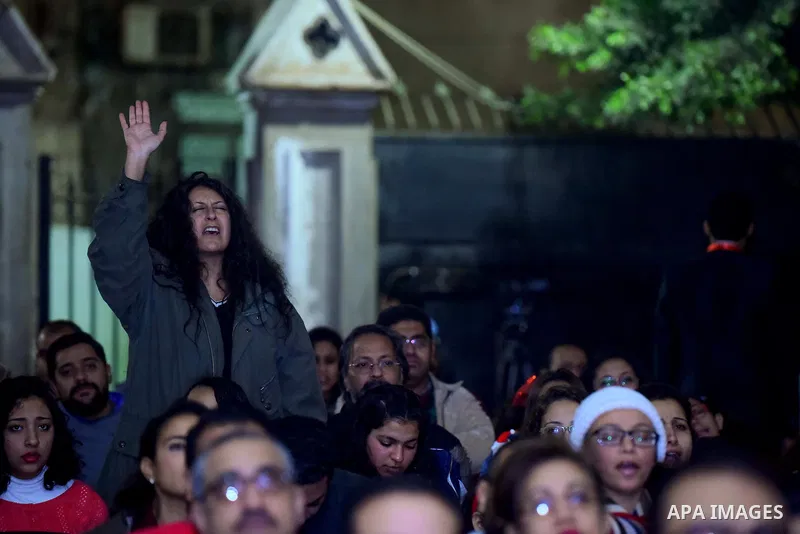 Egyptian Christians pray during a New Year's Eve mass, at Kasr el-Dobara evangelical Church, in Cairo, Egypt on December 31, 2017. Photo by Amr Sayed