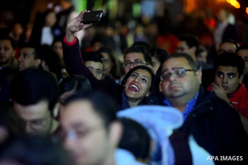 Egyptian Christians pray during a New Year's Eve mass, at Kasr el-Dobara evangelical Church, in Cairo, Egypt on December 31, 2017. Photo by Amr Sayed