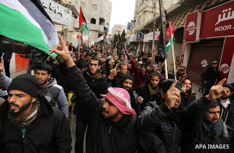 Palestinian supporters of Islamic Jihad movement take part during a protest against U.S. President Donald Trump's decision to recognise Jerusalem as the capital of Israel, in Khan Younis in the southern Gaza stirp on Jan...