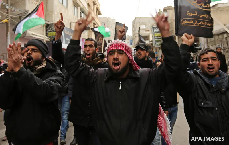Palestinian supporters of Islamic Jihad movement take part during a protest against U.S. President Donald Trump's decision to recognise Jerusalem as the capital of Israel, in Khan Younis in the southern Gaza stirp on Jan...