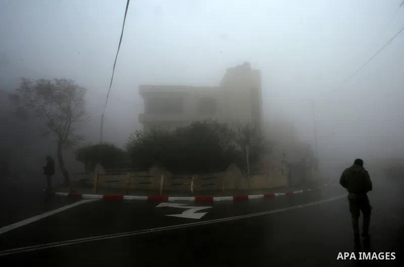 A view shows a heavy fog at Mount Gerizim near the northern West Bank city of Nablus, on January 5, 2018. Photo by Ayman Ameen