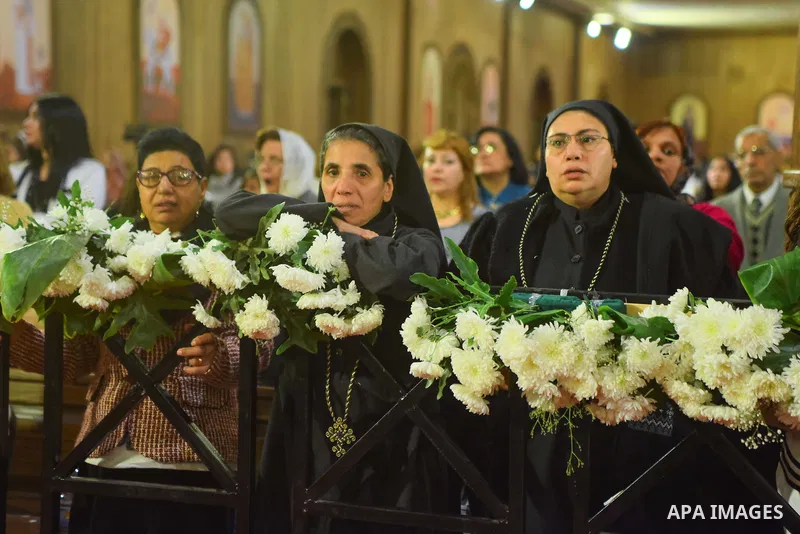 Coptic Orthodox Christians attend the Christmas Eve mass at the Nativity of Christ Cathedral in Cairo on January 6, 2018. Coptic Orthodox Christians packed the newly built Nativity of Christ Cathedral for a Christmas Eve...