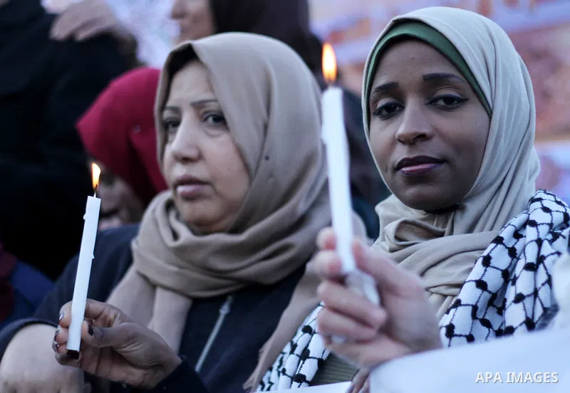 Palestinians hold a candles during a protest in support of Palestinian teenager Ahed Tamimi, 16-year-old in Gaza city on January 8, 2018. Israel charged Tamimi with 12 counts including assault on January 1 following her...