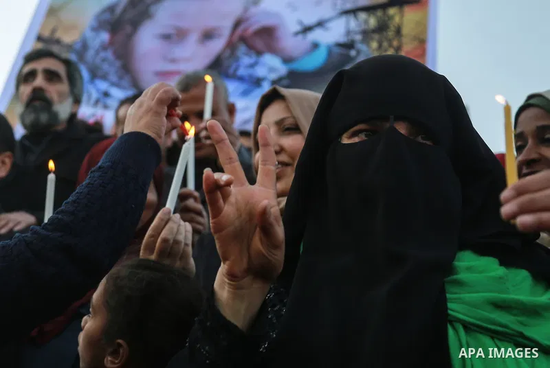 Palestinians hold candles during a protest in support of Palestinian teenager Ahed Tamimi, 16-year-old in Gaza city on January 8, 2018. Israel charged Tamimi with 12 counts including assault on January 1 following her ar...