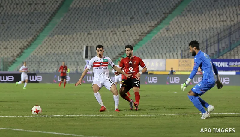 Egypt's al-Ahly and Zamalek players compete during the the Egyptian Premier League football match at the Cairo Stadium in the Egyptian capital on January 8, 2018. Photo by Amr Sayed