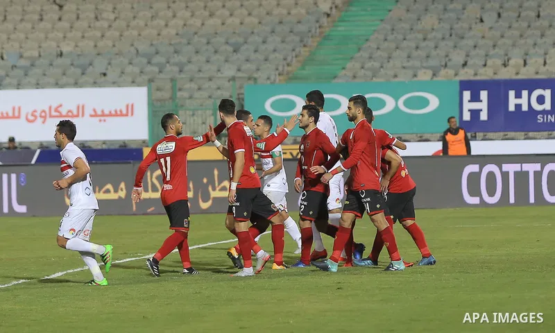 Egypt's al-Ahly and Zamalek players compete during the the Egyptian Premier League football match at the Cairo Stadium in the Egyptian capital on January 8, 2018. Photo by Amr Sayed