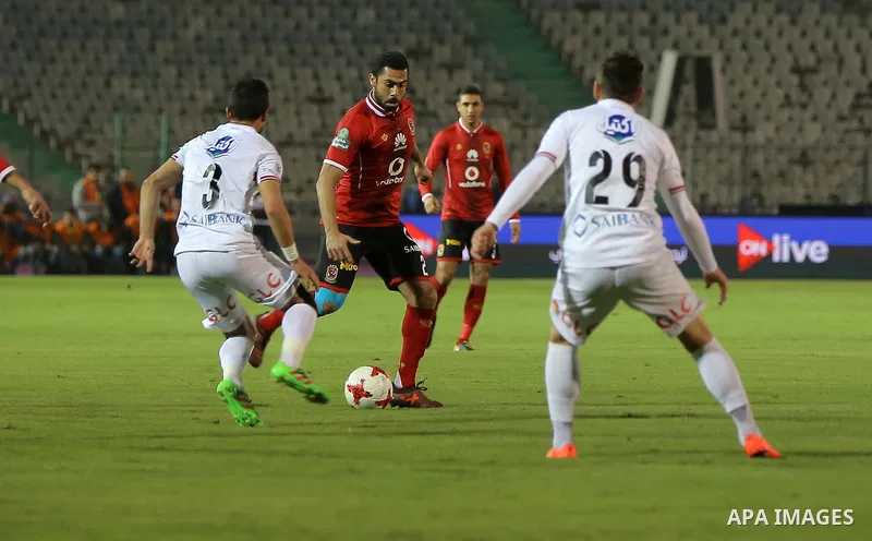 Egypt's al-Ahly and Zamalek players compete during the the Egyptian Premier League football match at the Cairo Stadium in the Egyptian capital on January 8, 2018. Photo by Amr Sayed
