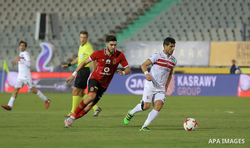 Egypt's al-Ahly and Zamalek players compete during the the Egyptian Premier League football match at the Cairo Stadium in the Egyptian capital on January 8, 2018. Photo by Amr Sayed