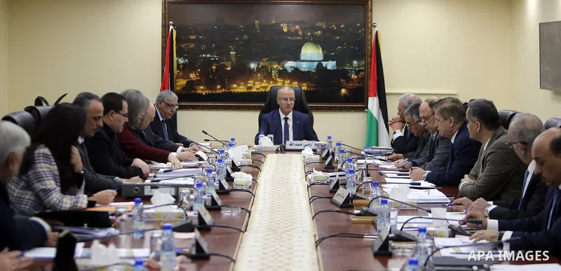 Palestinian Prime Minister, Rami Hamdallah, chairs a meeting of of council of Ministers in the West Bank city of Ramallah on January 9, 2018. Photo by Prime Minister Office