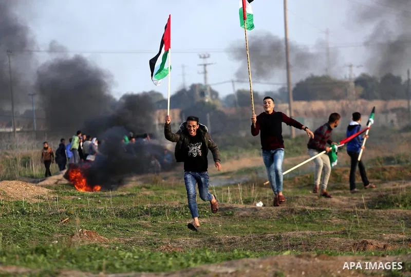 Palestinian protesters clash with Israeli security forces near the border with Israel in the east of Gaza City January 12, 2018 as demonstrations continue over the US president's controversial recognition of Jerusalem as...