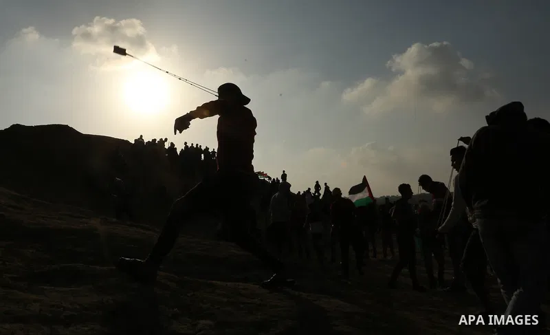 Palestinian protesters clash with Israeli forces at the Bureij refugee camp, in central Gaza on January 12, 2018 as demonstrations continue over the US president's controversial recognition of Jerusalem as Israel's capit...