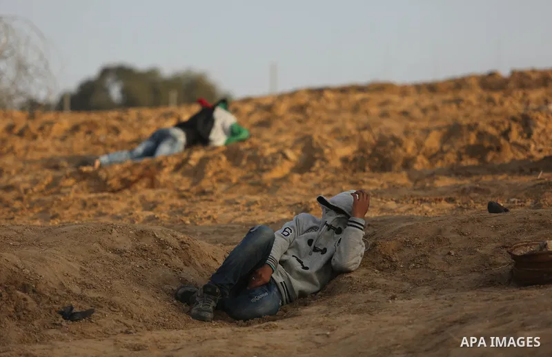 Palestinian protesters clash with Israeli forces at the Bureij refugee camp, in central Gaza on January 12, 2018 as demonstrations continue over the US president's controversial recognition of Jerusalem as Israel's capit...