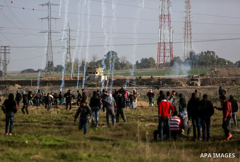 Palestinian protesters clash with Israeli security forces near the border with Israel in the east of Gaza City January 12, 2018 as demonstrations continue over the US president's controversial recognition of Jerusalem as...
