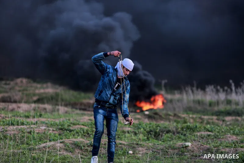 Palestinian protesters clash with Israeli security forces near the border with Israel in the east of Gaza City January 12, 2018 as demonstrations continue over the US president's controversial recognition of Jerusalem as...