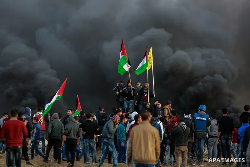 Palestinian protesters clash with Israeli security forces near the border with Israel in the east of Gaza City January 12, 2018 as demonstrations continue over the US president's controversial recognition of Jerusalem as...