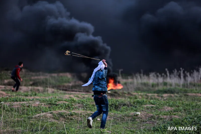 Palestinian protesters clash with Israeli security forces near the border with Israel in the east of Gaza City January 12, 2018 as demonstrations continue over the US president's controversial recognition of Jerusalem as...