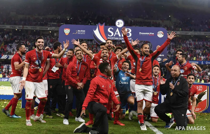 Al-Ahly's players celebrate winning the Egyptian Super Cup football match between Al-Ahly and Al Masry at Hazza bin Zayed Stadium, City of al-Ain, Abu Dhabi, United Arab Emirates, on January 12, 2018. Photo by Stranger