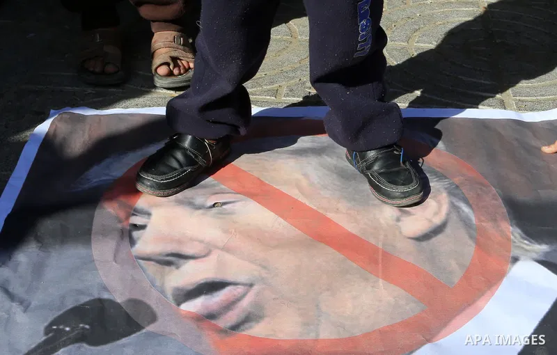 Palestinians take part in a protest against the US president's decision to recognise Jerusalem as the capital of Israel, in Gaza city, on January 14, 2018. Photo by Yasser Qudih