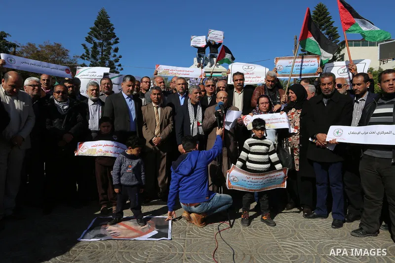 Palestinians take part in a protest against the US president's decision to recognise Jerusalem as the capital of Israel, in Gaza city, on January 14, 2018. Photo by Yasser Qudih