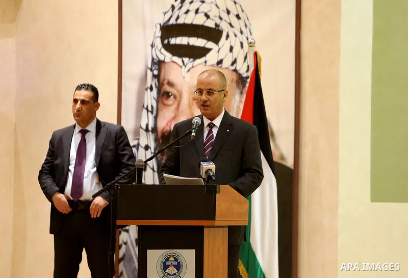 Palestinian Prime Minister, Rami Hamdallah celebrates to mark the tree day, in the West Bank city of Ramallah, on January 15, 2018. Photo by Prime Minister Office