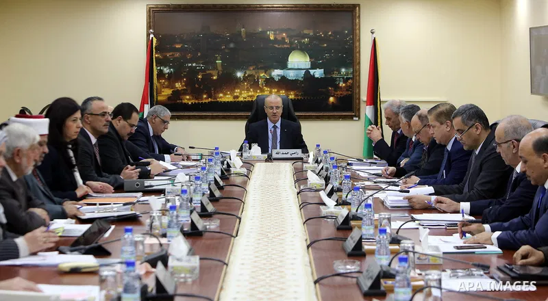 Palestinian Prime Minister, Rami Hamdallah, chairs a meeting of of council of Ministers, in the West Bank city of Ramallah, on January 16, 2018. Photo by Prime Minister Office