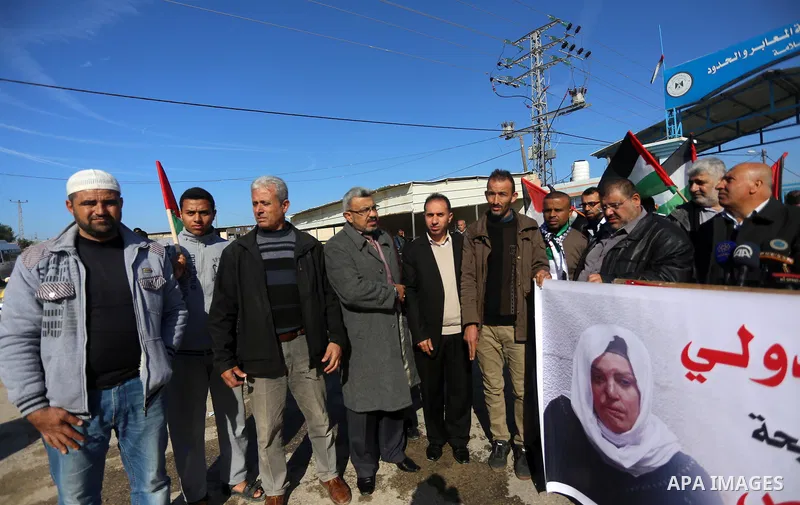 Palestinian members of National and Islamic forces take part in a protest of solidarity with prisoner Esraa Al-Jabbais held in Israeli jails in the northern Gaza Strip, on January 16, 2018. Photo by Mohammed Asad