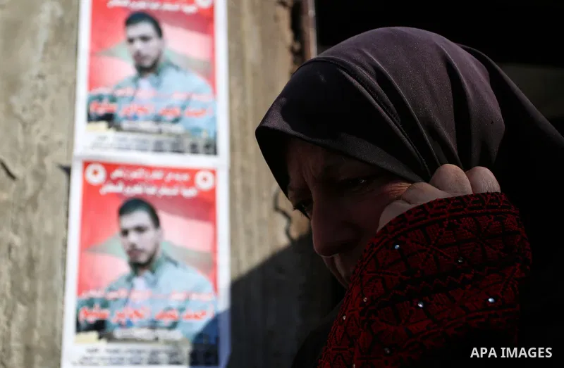 A Palestinian woman mourns during the funeral of Ahmad Saleem who was shot dead during clashes with Israeli security foces on the previous day in the West Bank village of Jayous near Qalqilya January 16, 2018. Photo by S...