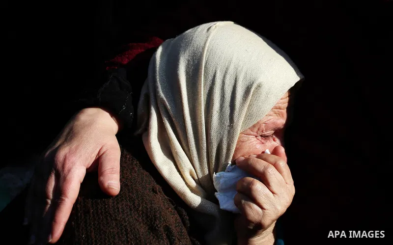 A Palestinian woman mourns during the funeral of Ahmad Saleem who was shot dead during clashes with Israeli security foces on the previous day in the West Bank village of Jayous near Qalqilya January 16, 2018. Photo by S...