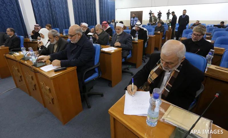 Members of the Palestinian legislative council attend a meeting at the legislative council, in Gaza city on January 17, 2018. Photo by Mohammed Asad