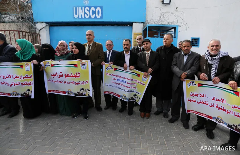 Palestinians take part in a protest following Trump's decision to recognise Jerusalem as the capital of Israel, in front of the headquarter United Nation "UNSCO" in Gaza City, on January 18, 2018. Photo by Ashraf Amra