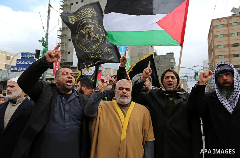 Palestinian supporters of Islamic Jihad take part during a protest against U.S. President Donald Trump's decision to recognise Jerusalem as the capital of Israel, in Gaza city, on January 19, 2018. Photo by Ashraf Amra