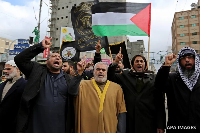 Palestinian supporters of Islamic Jihad take part during a protest against U.S. President Donald Trump's decision to recognise Jerusalem as the capital of Israel, in Gaza city, on January 19, 2018. Photo by Ashraf Amra