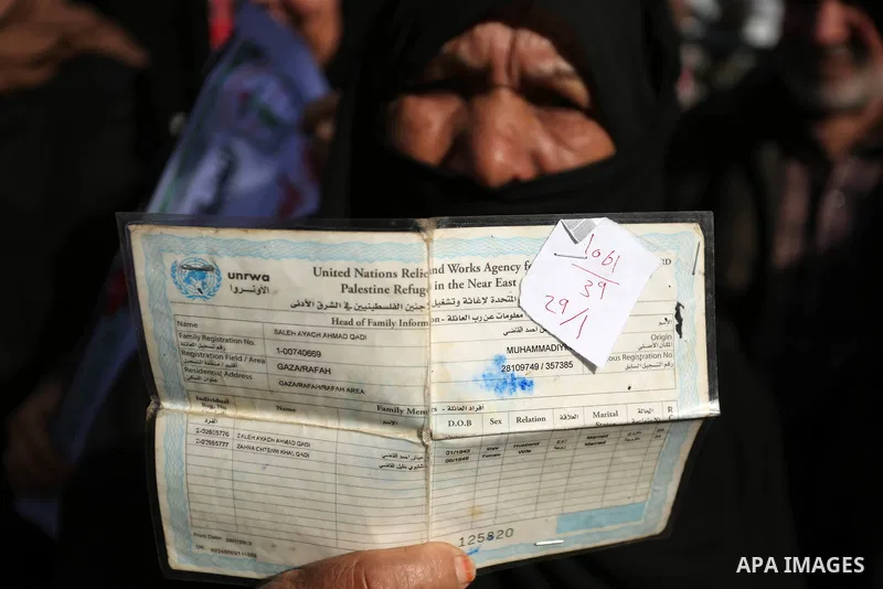 Palestinians take part in a protest outside a United Nations (UN) distribution centre in Rafah in the southern Gaza Strip, on January 21, 2018, following the decision by the US government to froze tens of millions of dol...