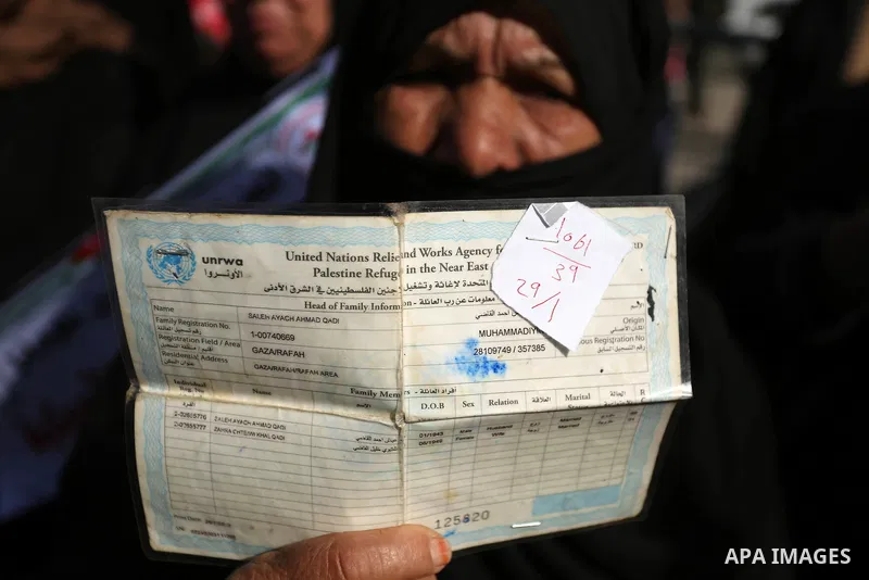 Palestinians take part in a protest outside a United Nations (UN) distribution centre in Rafah in the southern Gaza Strip, on January 21, 2018, following the decision by the US government to froze tens of millions of dol...