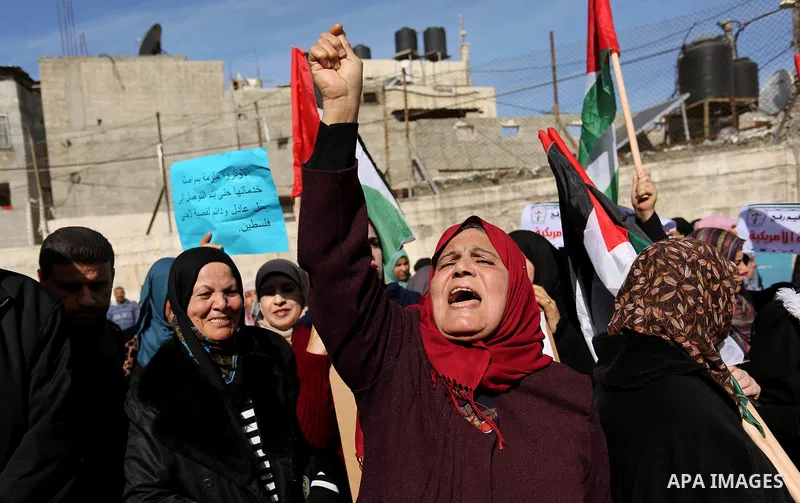 Palestinians take part in a protest outside a United Nations (UN) distribution centre in Rafah in the southern Gaza Strip, on January 21, 2018, following the decision by the US government to froze tens of millions of dol...