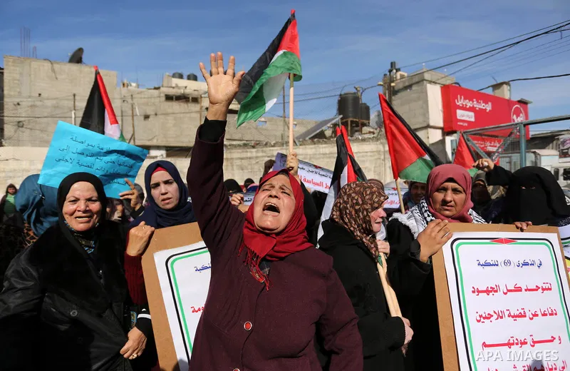 Palestinians take part in a protest outside a United Nations (UN) distribution centre in Rafah in the southern Gaza Strip, on January 21, 2018, following the decision by the US government to froze tens of millions of dol...