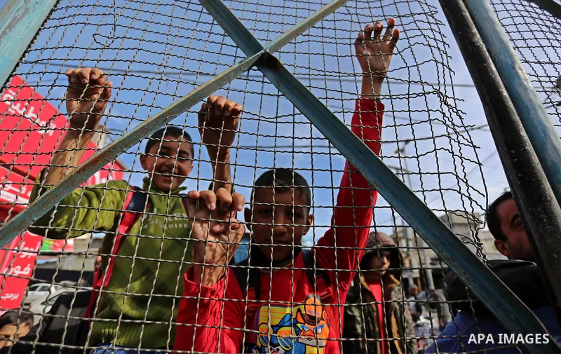 Palestinians take part in a protest outside a United Nations (UN) distribution centre in Rafah in the southern Gaza Strip, on January 21, 2018, following the decision by the US government to froze tens of millions of dol...