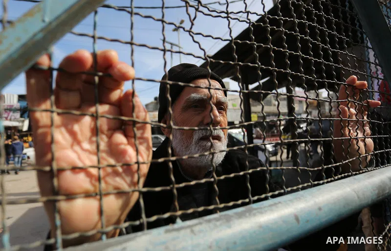 Palestinians take part in a protest outside a United Nations (UN) distribution centre in Rafah in the southern Gaza Strip, on January 21, 2018, following the decision by the US government to froze tens of millions of dol...