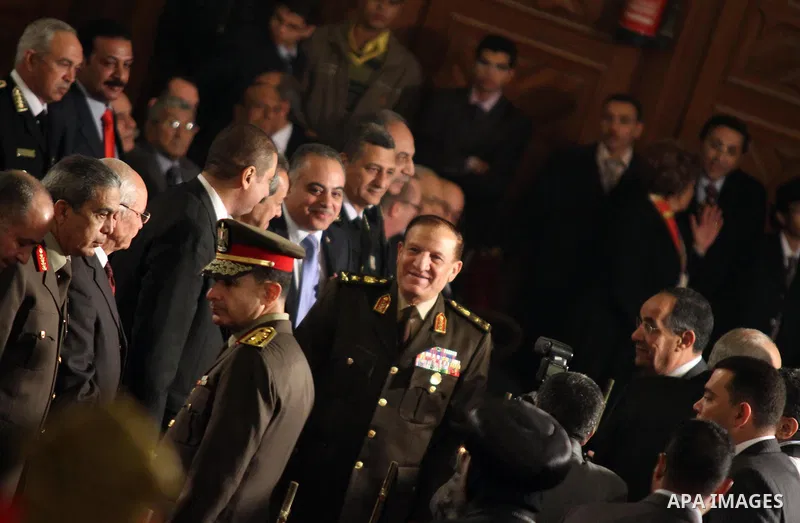 (FILES) This file photo taken on January 6, 2012 shows Former Armed Forces Chief of Staff Sami Anan and member of the SCAF at the Supreme Council of the Armed Forces, and other high-ranking military officials attend the...