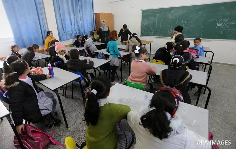 Palestinian schoolgirls attend a class at a school belonging to the United Nations Relief and Works Agency for Palestine Refugees (UNRWA) in Gaza City on January 22, 2018. Photo by Mohammed Asad