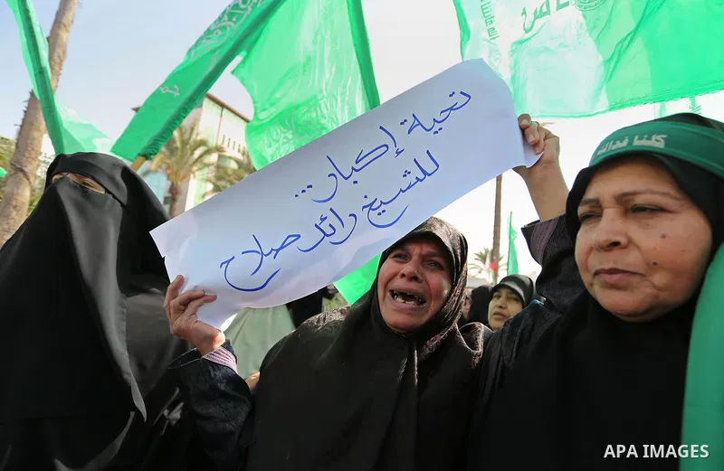 Palestinian women take part in a protest against US President Donald Trump's decision to recognise Jerusalem as the capital of Israel and to freeze tens of millions of dollars in contributions to the United Nations Relie...