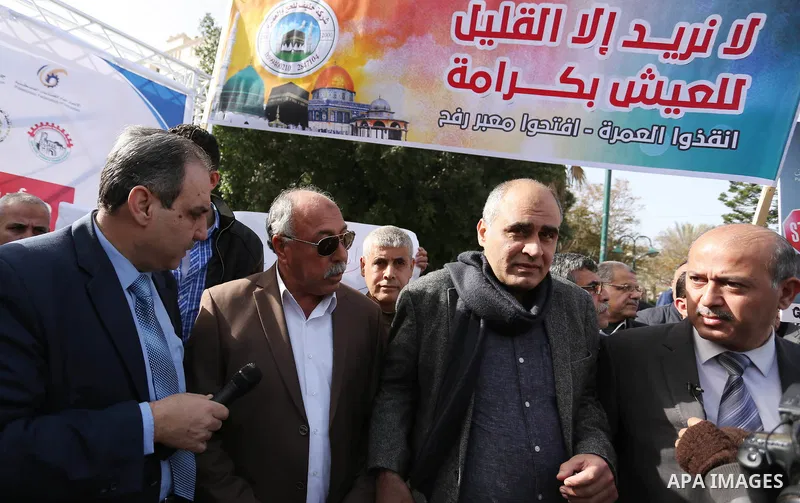 Palestinians take part in a protest against the siege on Gaza and the economic situation, in Gaza city on January 22, 2018. Photo by Ashraf Amra