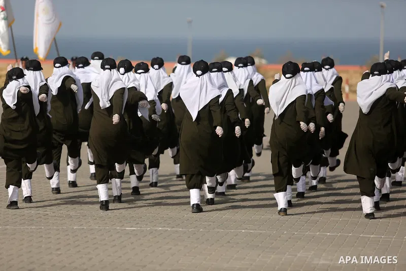 Palestinian police women show their skills during a graduation ceremony, in Gaza city on January 22, 2018. Photo by Ashraf Amra