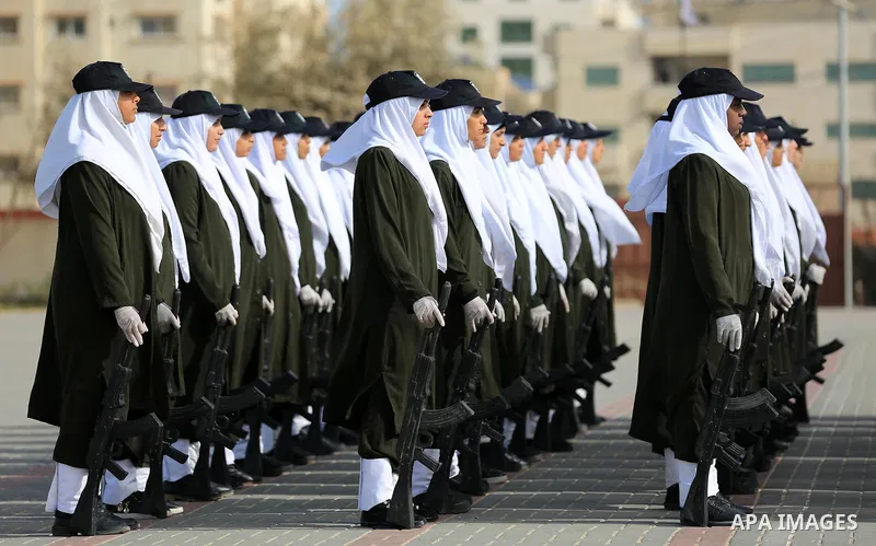 Palestinian police women show their skills during a graduation ceremony, in Gaza city on January 22, 2018. Photo by Atia Darwish