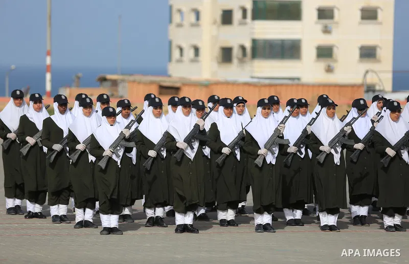 Palestinian police women show their skills during a graduation ceremony, in Gaza city on January 22, 2018. Photo by Atia Darwish